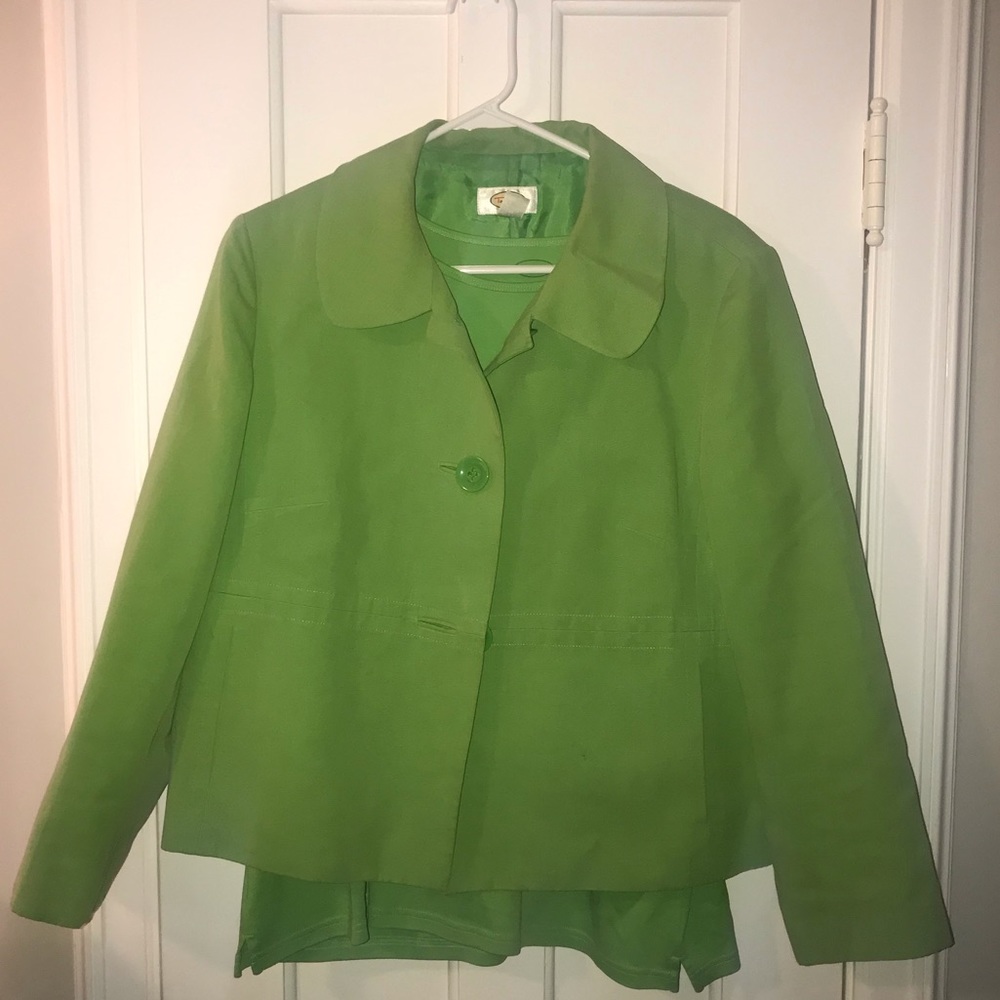 Green jacket and t-shirt combination.